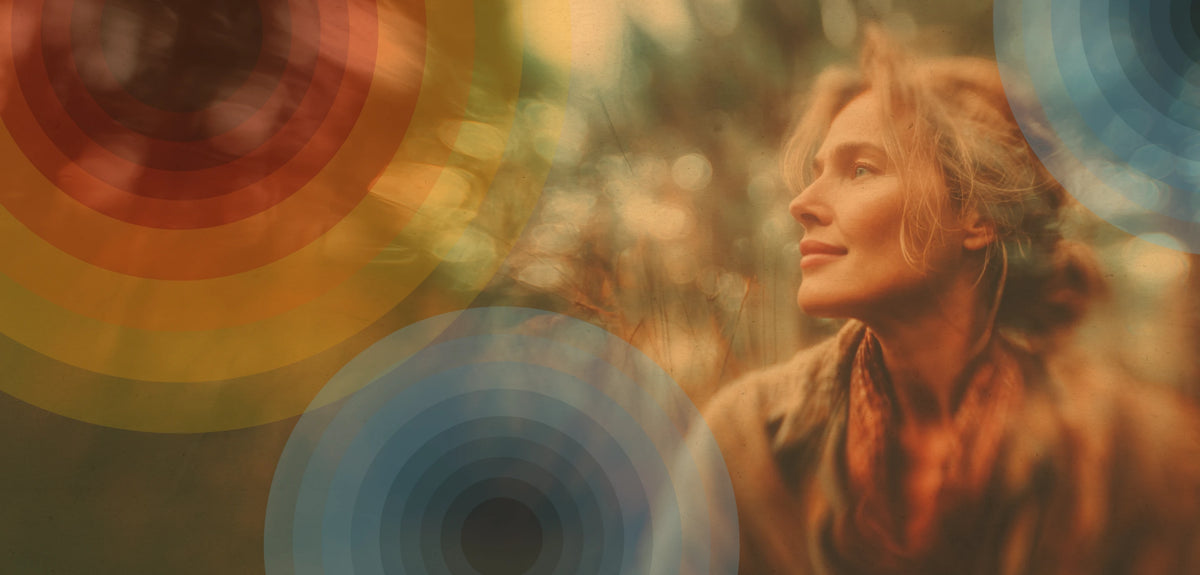 Woman in the sun at an open window